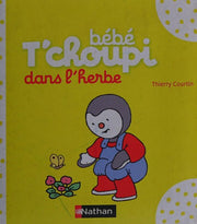 Bébé T'choupi dans l'herbe