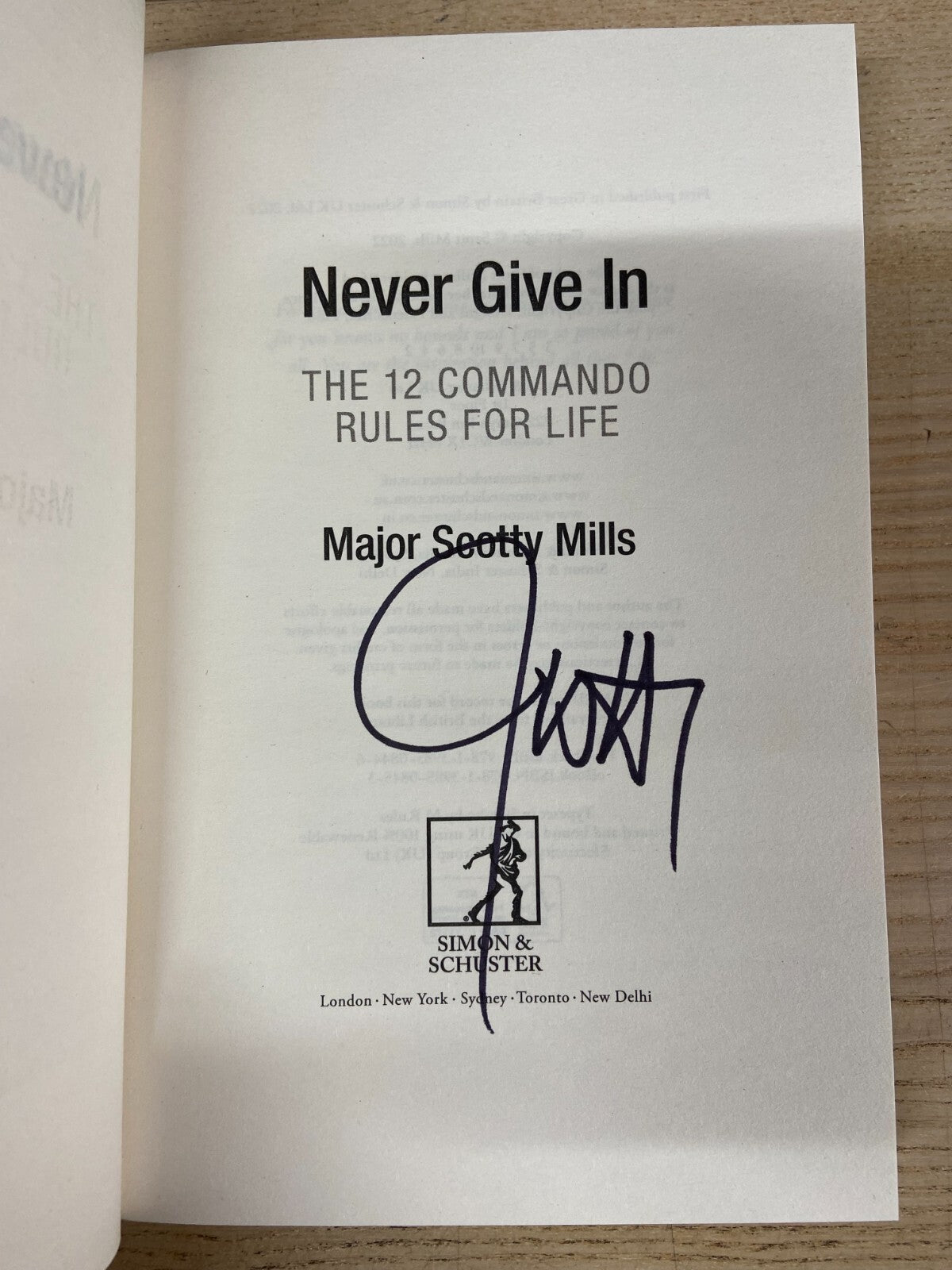 Never Give In - Scotty Mills - Signed Hardback